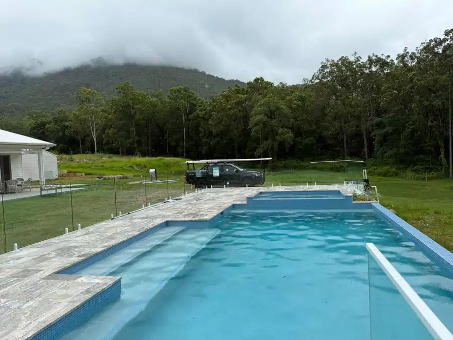Custom concrete pool in Brisbane designed for a residential backyard